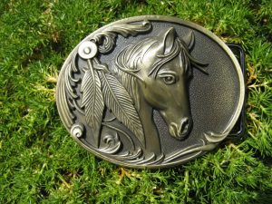 HORSE HEAD AND FEATHERS BRONZE BELT BUCKLE