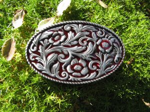 WESTERN SCROLLWORK RED BELT BUCKLE