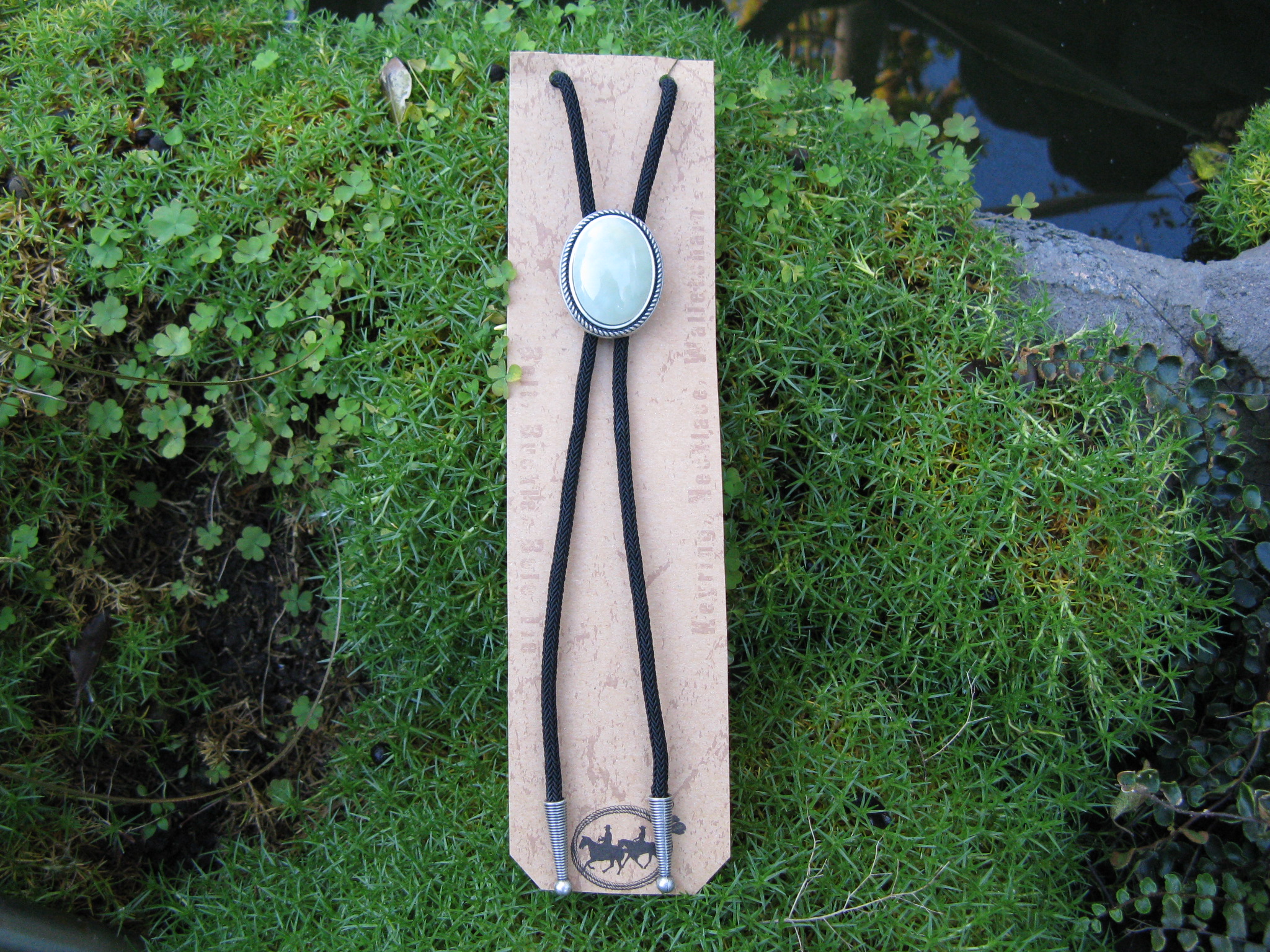 SILVER PLATED NEW MOUNTAIN JADE OVAL BOLO TIE
