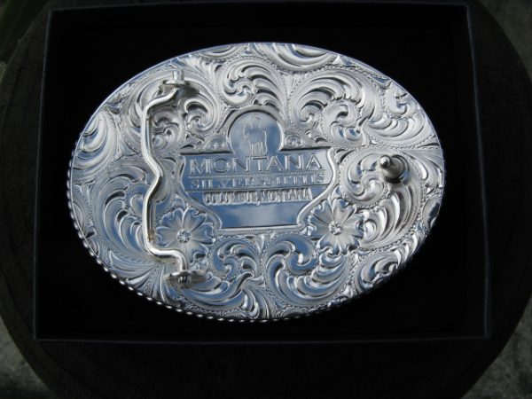 LARGE SILVER ENGRAVED WESTERN BELT BUCKLE WITH GOLD TRIM