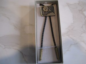 SAND CAST AND HAND POLISHED BRONZE WOLF AND MOON BOLO TIE