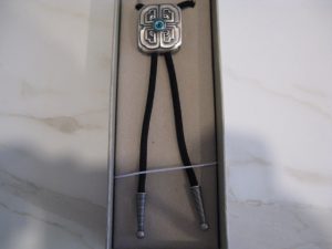 LUCKY CROSS KNOT SILVER PLATED BOLO TIE